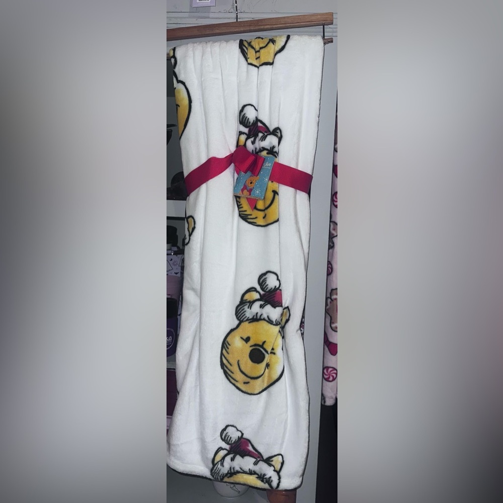 Winnie the Pooh Christmas blanket.